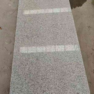 牡丹江芝麻白光面毛板